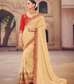 Cream Embroidered Silk Saree With Blouse