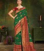 Green woven silk saree with blouse