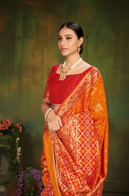 Orange woven silk saree with blouse 2