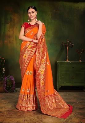 Orange woven silk saree with blouse 1