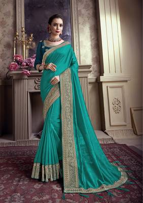 Dark turquoise embroidered chiffon saree with blouse 1