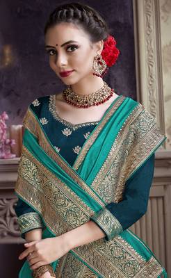 Dark turquoise embroidered chiffon saree with blouse 2