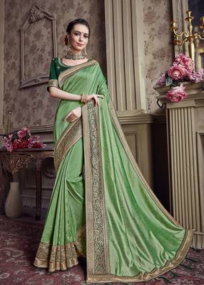 Light green embroidered chiffon saree with blouse 1