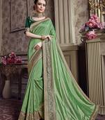 Light green embroidered chiffon saree with blouse