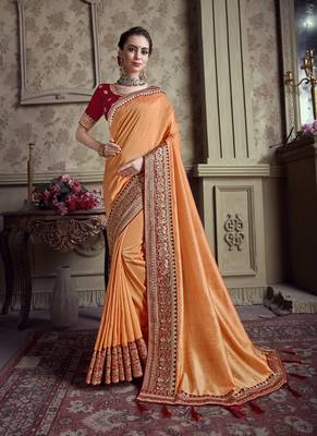 Orange embroidered chiffon saree with blouse 1