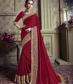 Red embroidered chiffon saree with blouse