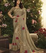 Beige embroidered silk saree with blouse