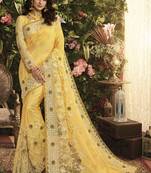 Yellow embroidered silk saree with blouse