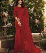 Red embroidered silk saree with blouse