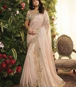 Light pink embroidered silk saree with blouse