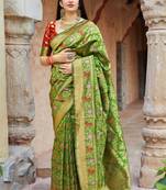 Green woven banarasi silk saree with blouse