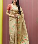 Cream woven banarasi silk saree with blouse