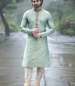 Turquoise embroidered dupion silk men-kurtas