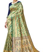 Green woven art silk saree with blouse