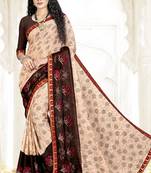 cream embroidered chiffon saree with blouse