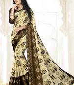 beige embroidered chiffon saree with blouse