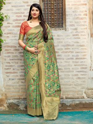 Green woven banarasi saree with blouse 1
