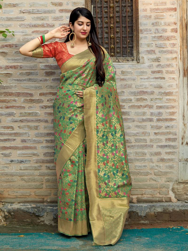 Green woven banarasi saree with blouse