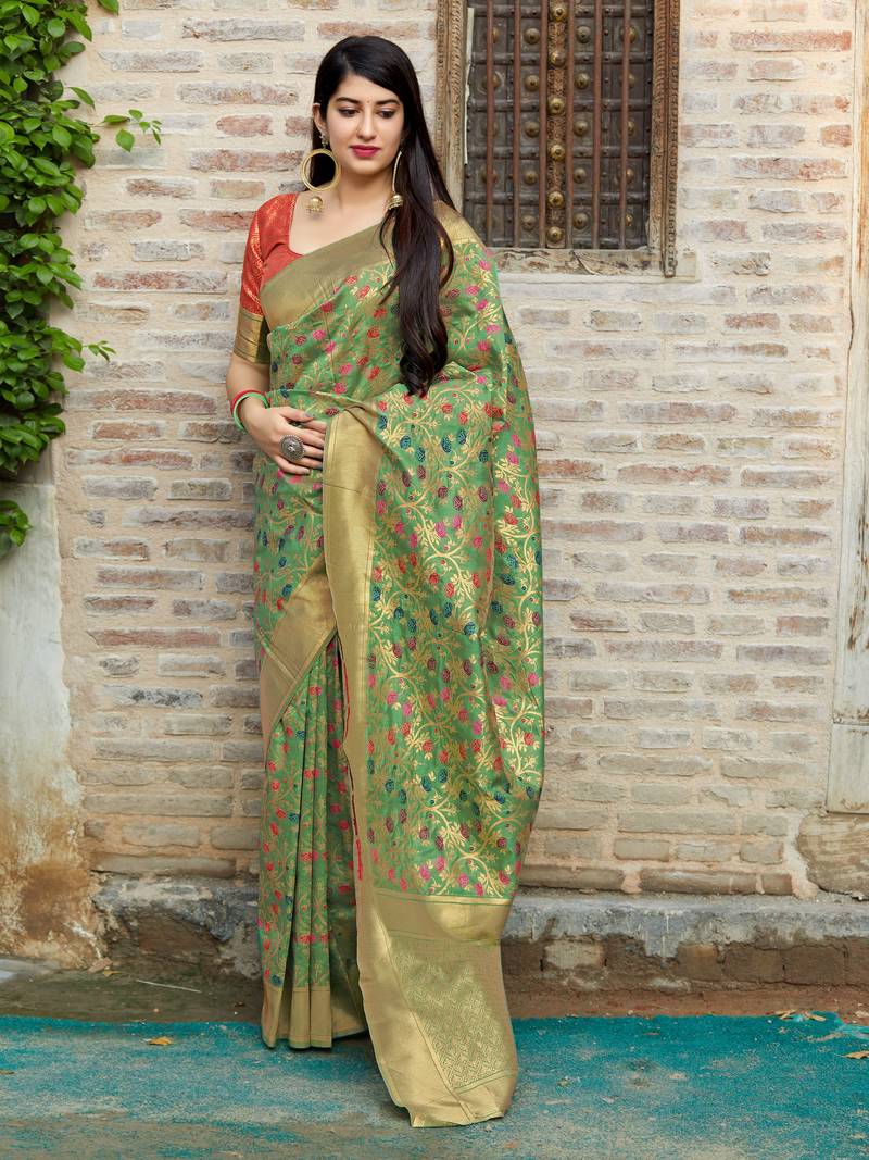 Green woven banarasi saree with blouse