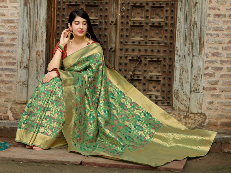 Green woven banarasi saree with blouse