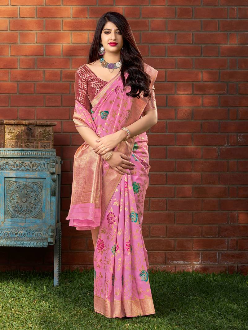 Pink woven banarasi silk saree with blouse