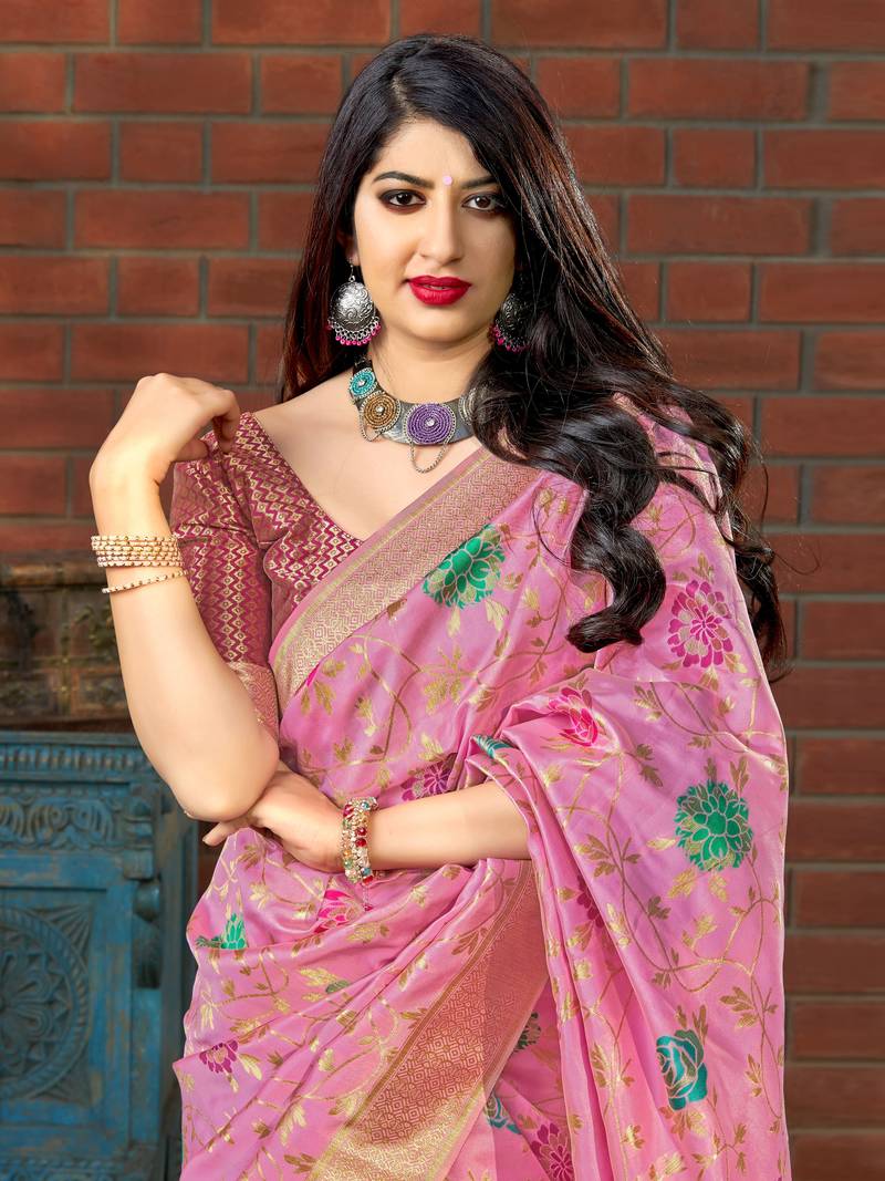 Pink woven banarasi silk saree with blouse