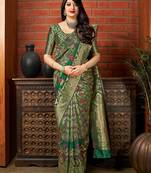 Green woven banarasi silk saree with blouse