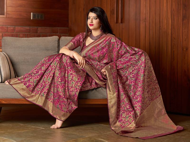 Pink woven banarasi silk saree with blouse