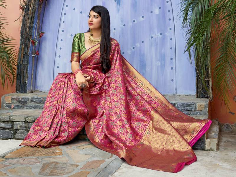 Pink woven banarasi saree with blouse