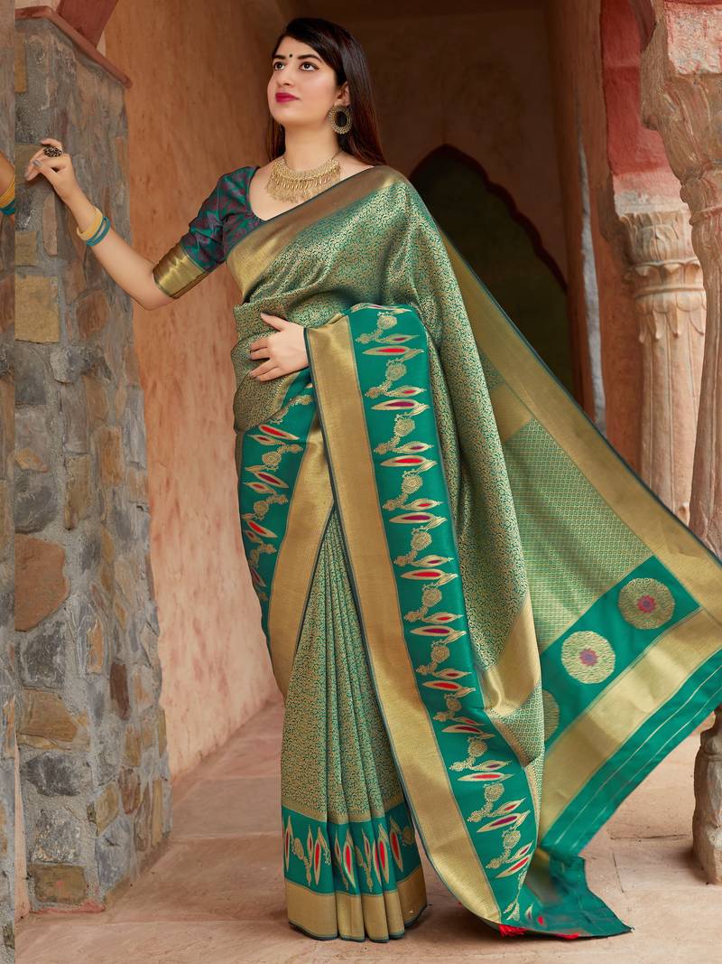 Green woven banarasi saree with blouse