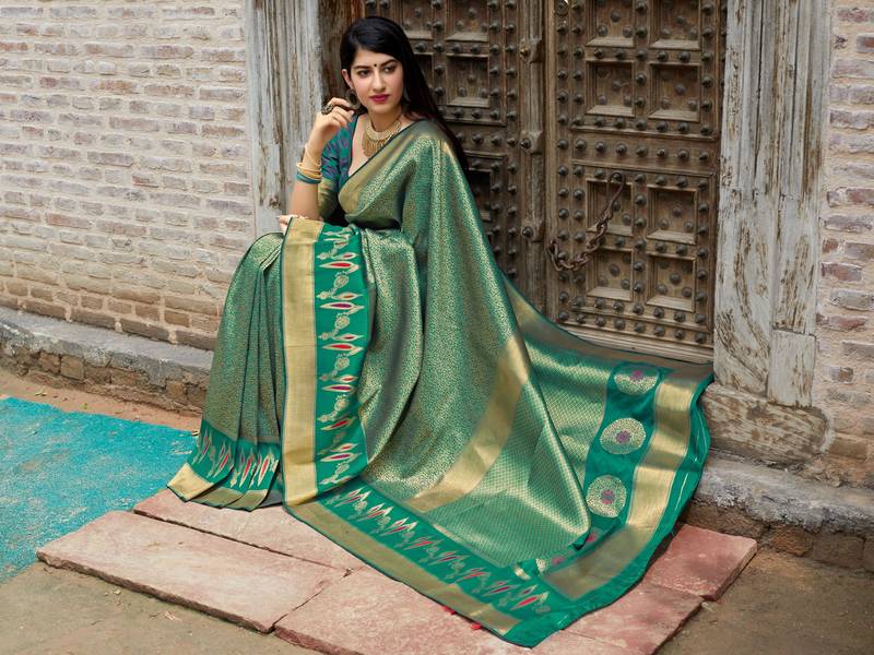 Green woven banarasi saree with blouse