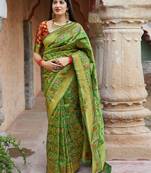 Green woven banarasi saree with blouse