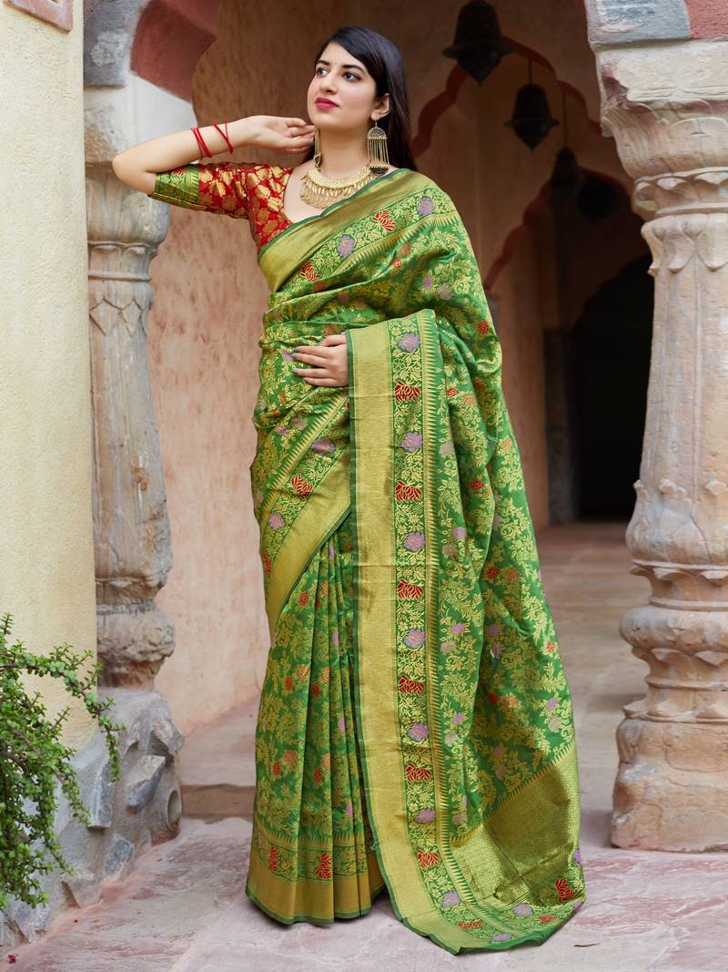 Green woven banarasi saree with blouse