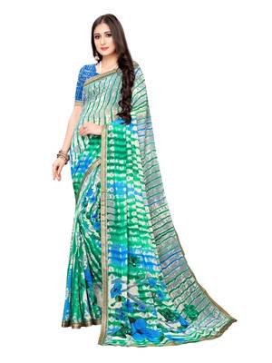 Green printed georgette saree with blouse 1