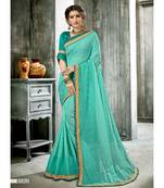Green Woven Georgette Saree With Blouse