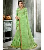 Green Woven Georgette Saree With Blouse