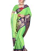 Green woven silk blend saree with blouse