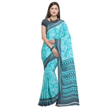 Turquoise printed crepe saree with blouse 1