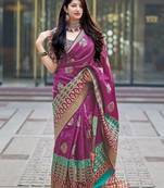 Magenta woven banarasi silk saree with blouse