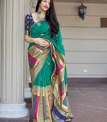 Green woven banarasi silk saree with blouse