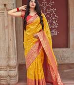 Yellow woven banarasi silk saree with blouse