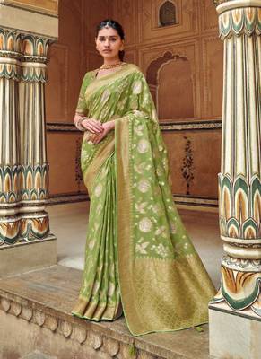   light green woven silk saree with blouse 1