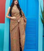 Beige woven banarasi silk saree with blouse