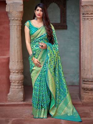 Turquoise woven banarasi silk saree with blouse 1