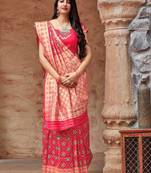 Pink woven banarasi silk saree with blouse