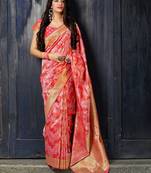 Pink woven banarasi silk saree with blouse