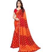 Orange printed chiffon saree with blouse