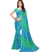 turquoise printed chiffon saree with blouse