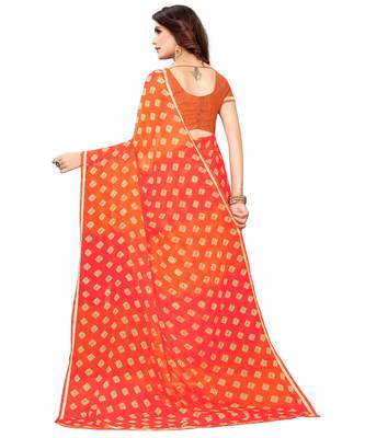 Orange printed chiffon saree with blouse 4