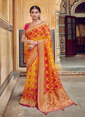 Orange woven silk saree with blouse 1